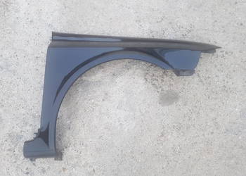 Renault Laguna 2 błotnik przód przedni czarny NV676 błotniki