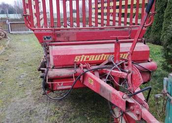 Przyczepa samozbierająca marki "Strautmann"