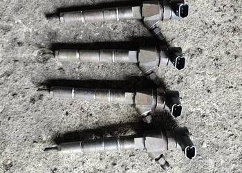 Wtryskiwacze komplet opel insignia niski przebieg gwarancja 0445110327