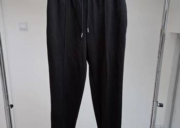 Czarne spodnie sportowe joggersy z ozdobną kantką Move