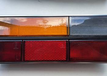 NOWA oryginalna lampa tylna lewa Audi 100 C2 431945217