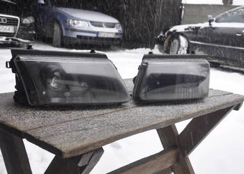 Reflektory Lampy Hella Black Passat B5 Xenon Komplet Kierunki