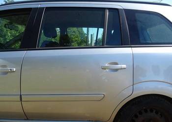 Drzwi szyba mechanizm podnośnik srebrne Zafira B