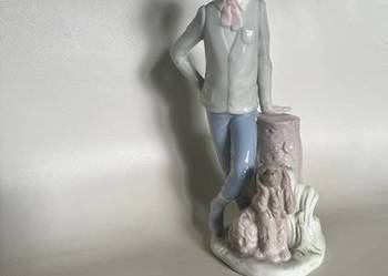 Kolekcjonerska figurka porcelanowa Lladro Nao (pies i chłopiec)