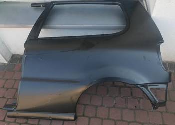BŁOTNIK TYL POLO LEWY 94-2000 3DRZWI