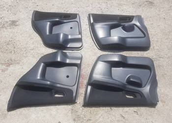 Suzuki Ignis Subaru G3X Justy boczki tapicerki drzwi wnętrze