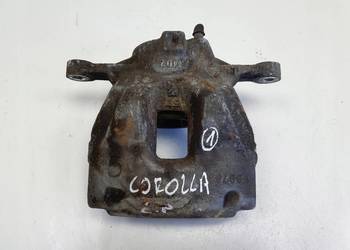 Toyota Corolla XII E21 PRZEDNI ZACISK HAMULCOWY lewy przód KIEROWCY L.P