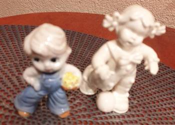 Dwie figurki ceramiczne dzieci