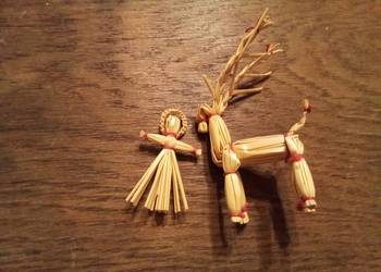 Świąteczne figurki ze słomy kozioł i kobieta. Vintage