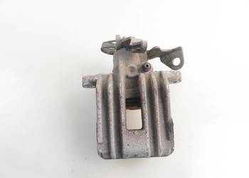 ZACISK PRAWY TYŁ VW PASSAT B5 1.9 TDI