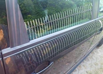 Audi A2 Uszczelka szyby drzwi lewy tył Listwa zgarniająca 8Z0839477A