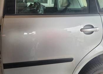 Drzwi lewy tył  vw polo 9n.