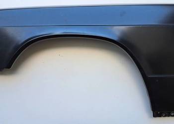 Błotnik lewy Mercedes W201 190 Made in Italy bez otworu na kierunkowskaz