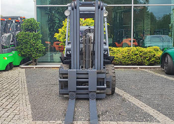 Pozycjoner z widłami obrotowymi Kaup 1,5T 411D 2002