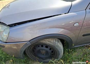 Błotnik Lewy Przód Opel Corsa C