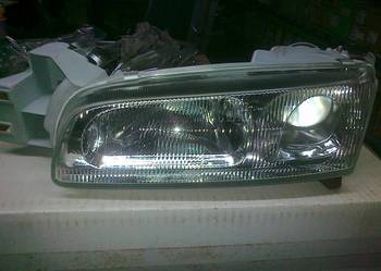 MAZDA 626  93> REFLEKTOR (LAMPA) SOCZ. MAN. PR. NOWY