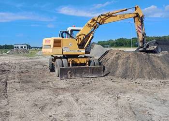 Liebherr 312 z osprzętem .