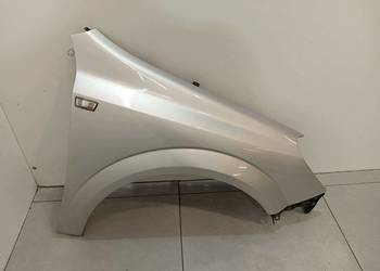 BŁOTNIK PRAWY PRZÓD SREBRNY  Opel Astra III (2004-2014  ) H