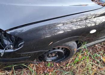 Błotnik lewy Nissan Almera n16 kolor Z11