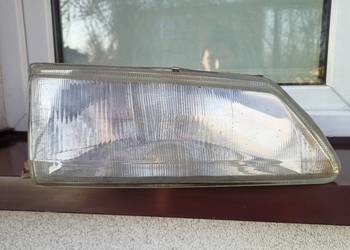 Peugeot 106 lampa przednia prawa reflektor przód pasażera
