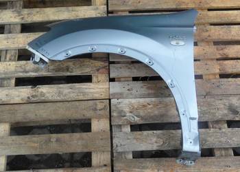 NISSAN QASHQAI I J10 LIFT 10r błotnik lewy przód