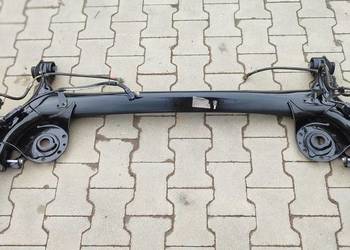 MAZDA 2 TOYOTA YARIS IV BELKA ZAWIESZENIE TYŁ 1.5 HYBRID 2025