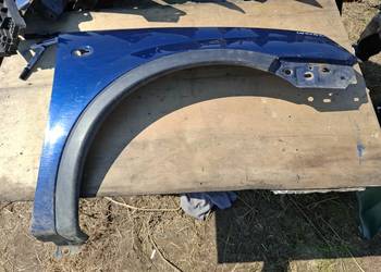 Błotnik Prawy Przód Opel Corsa C .