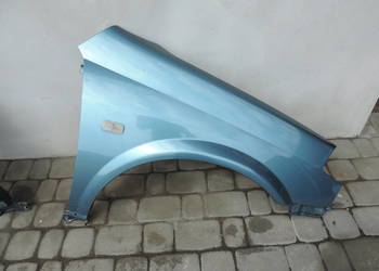 NISSAN PRIMERA P12 BŁOTNIK PRAWY PRZÓD BY4G