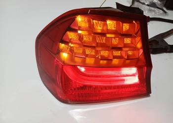 LAMPA LEWA TYLNA BMW E90 LIFT OE 7154153