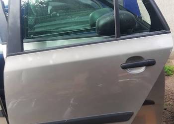 drzwi lewe tylne Skoda Fabia II lak. 9202 07-14r lewy tył kompletne