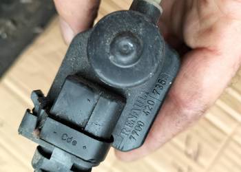 SILNICZEK REGULACJI LAMPY RENAULT  7700420736