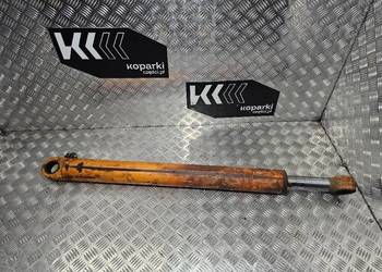 Siłownik hydrauliczny podnoszenia łap (stabilizatora) Case 580 SLE M SM