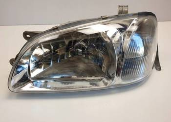 LAMPA LEWA Kia Carnival I PRZEDNIA lewy przód