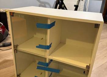Ikea EKET Szafka z 4 przegrodami - biała z szklanymi drzwiczkami