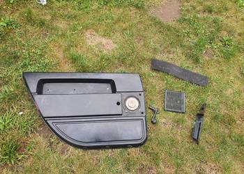 Boczek drzwi tylnych lewych lewy tył korba Volvo 940 740 czarny