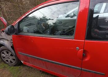 Drzwi prawe lewe Renault Twingo 2010r kod lak OV727.