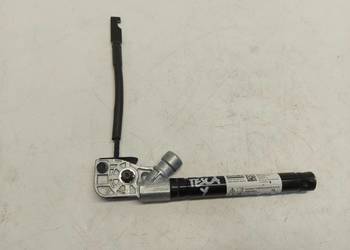 TESLA MODEL Y 2024r NAPINACZ DOPINACZ PASA LEWY PRZÓD 1090322-E1-A