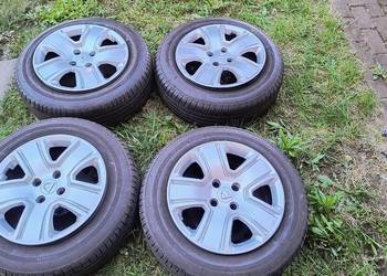 Felgi 4x100 + Bridgestone t005 185/65r15 kołpaki Dacia Logan lodgy dokker