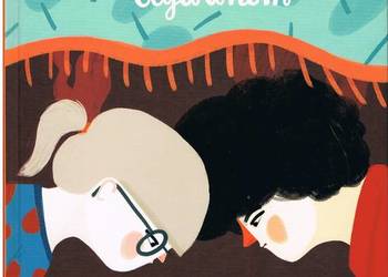 Z głową pod dywanem