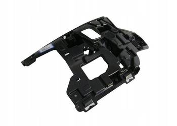 VOLVO V40 mocowanie lewy spryskiwacz lampy OE 31425001