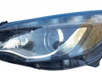 LAMPA LEWY PRZÓD REFLEKTOR EU XENON OPEL ASTRA IV J 1ZT010012