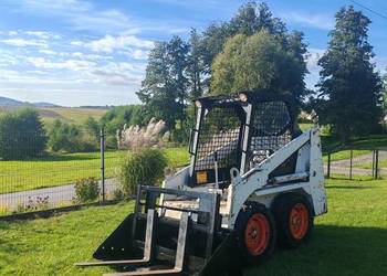 Miniładowarka Bobcat 533, łyżka/widły do palet