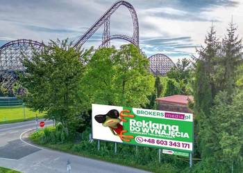 Reklama Billboard Zator Energylandia Wydruk montaż oświetlenie 12 x 3m