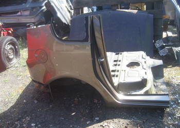 skoda roomster lift 10-15r błotnik tył prawy  kod LF8N