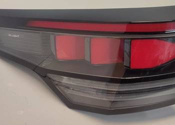 VW TAYRON LAMPA LEWY TYŁ 57L945207A