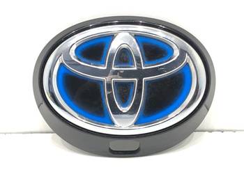 EMBLEMAT TYŁ TOYOTA COROLLA E21 Hatchback ZNACZEK LOGO 67930-02060 2.0