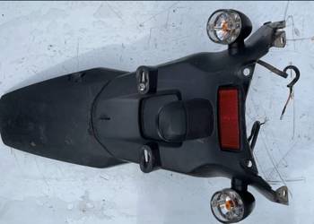 uchwyt mocowanie rejestracji kierunkowskazy SYM Orbit II 50