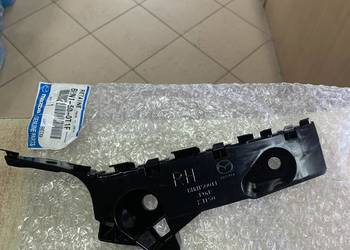 MAZDA 3 ŚLIZG MOCOWANIE ZDERZAKA PRAWY PRZÓD BHN1500T1