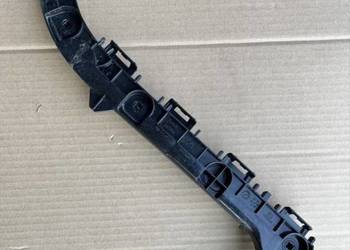 TOYOTA COROLLA E21 KOMBI ŚLIZG MOCOWANIE ZDERZAKA LEWY TYŁ 52576-02201