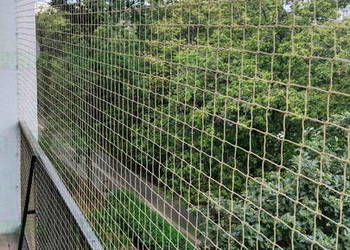 Siatka na balkon bez zadaszenia montaż Warszawa siatka na balkon dla kota